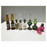 Oil lamps, one damaged
