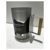 Charcoal starter appears unused