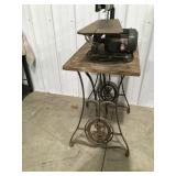 scroll saw on antique sewing machine base