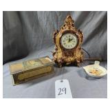 Clock with a few chips works & Whitman's Metal Box