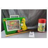 Big Bird Thermos and Windup Musical Television Toy