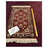Small fringe area rug