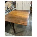 Vtg. Drop leaf tables wood wheels 8 leg table