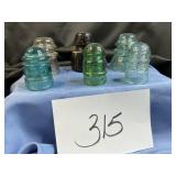 6 Vtg glass insulators