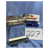Collection of toy buses, some new in package