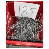 Crate full of display hangers for Peg Board 50+