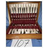 Classic flatware in wooden storage
