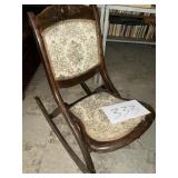 Pressed back folding rocker