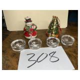 Candleholders and Christmas music boxes