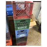 Five decommissioned milk crates