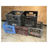 Five decommissioned milk crates
