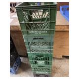 Five decommissioned milk crates