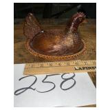 Amber glass hen on Nest
