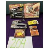 (2) arrow staple guns with staple