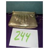 New York and Company gold evening purse with