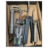 Grease guns and grease cartridges