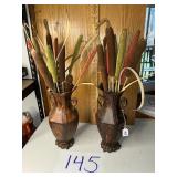 Dried flowers in tin vases