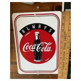 Plastic Coca-Cola advertising sign