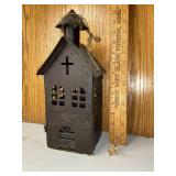 Punched tin votive church