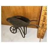 Punched tin wheelbarrow decor