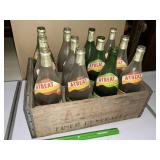A ï¿½ treat wooden soda crate with bottles