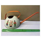 Toy tin watering can