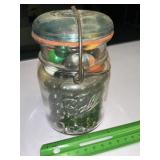 Old pint canning jar with Marbles, mostly modern