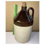 Single handle Brown over tan pottery jug