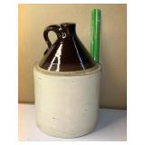 Single handle Brown over tan pottery jug
