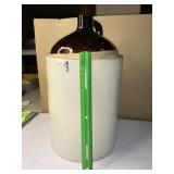 #3 round over 10 single handled pottery jug