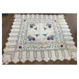Quilt With Floral and Bird Motifs