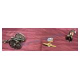 Collectible Lead Cannon, USSR Pins, and Cowboy