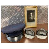 Police Hat, Photograph, and Cast-Iron Bookends