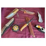 Knives with Leather Sheaths and Badge