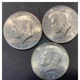 Three Kennedy Half Dollars