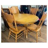 Oak Table with Four Pressed Back Chairs and Leaf