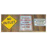 Three Reflective Metal Road Signs