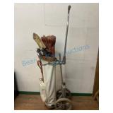 Bag Cart With Assorted Golf Clubs
