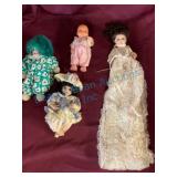Four Dolls