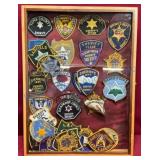 Display Case With Colorado Sheriff Patches