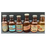 Six Promotional Beer Salt Shakers