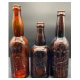 Three Embossed Beer Bottles