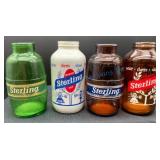 Four Sterling Beer Bottles