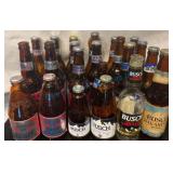 24 Busch and Bud Light Bottles
