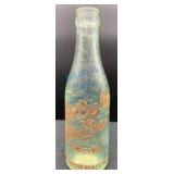 Early Embossed Capital Brewing Co. Bottle