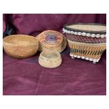 Four Woven Baskets with Cowrie Shell Adornment