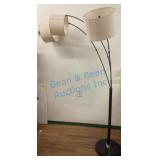 Three-Arm Floor Lamp With Curved Design
