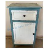 Wooden Cabinet With Distressed Paint Finish