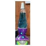 Colorful Lava Lamp With Smiling Base Design