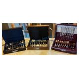 Three Boxed Flatware Sets Display